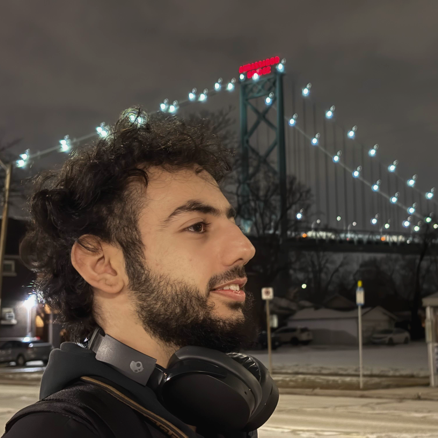 photo of Ali taken in front of the bridge on campus by Sawaiz
